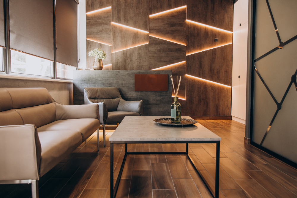 A chic living room with a plush couch and a simple coffee table, highlighting a blend of comfort and modern aesthetics